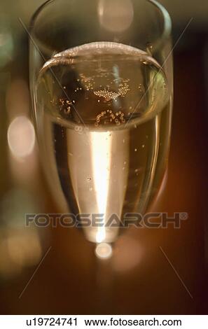 Stock Image - Close-up of glass with champagne. Fotosearch