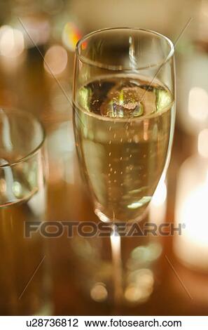 Stock Image - Close-up of glass with champagne. Fotosearch