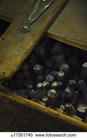 Stock Photography - Close up of printing blocks from antique book binding. Fotosearch