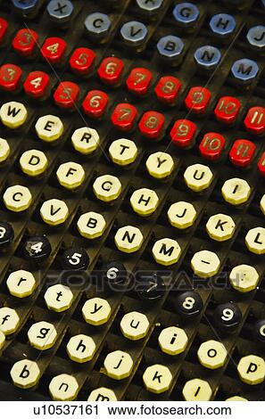 Stock Image - Close up of push buttons from printing press. Fotosearch