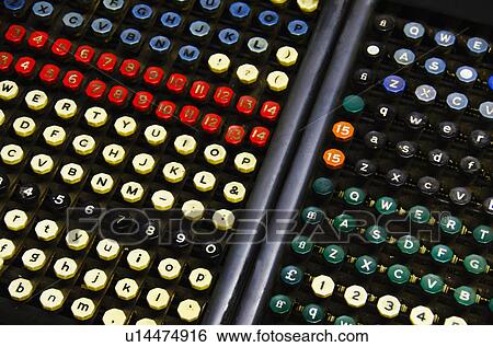 Stock Photograph - Close up of push buttons from printing press. Fotosearch
