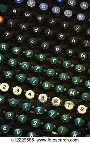 Stock Photography - Close up of push buttons from printing press. Fotosearch