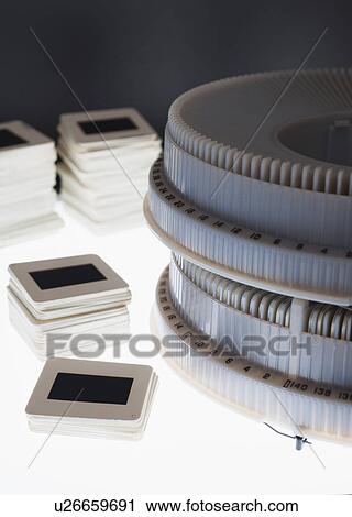Close up of slides and on round slide tray View Large Photo Image Stock Image - Close up of slides and on round slide tray. Fotosearch