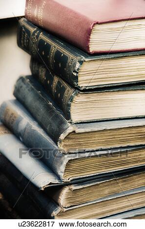 Close up stack of antique books View Large Photo Image Stock Photo - Close up stack of antique books . Fotosearch