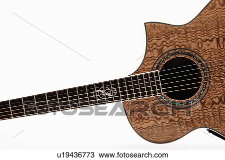 Stock Image - Close-up view of acoustic guitar. Fotosearch