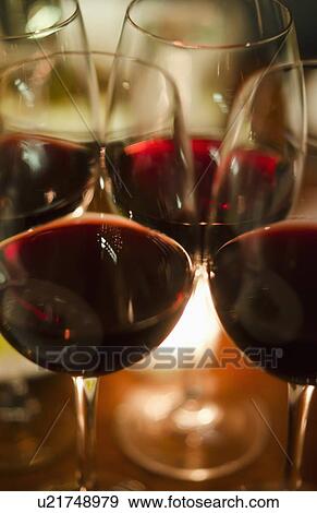 Close-up view of red wine glasses View Large Photo Image Stock Photo - Close-up view of red wine glasses. Fotosearch