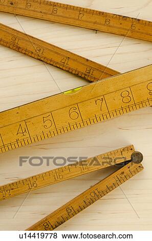 Close up view of wooden measure View Large Photo Image Stock Photo - Close up view of wooden measure. Fotosearch