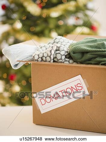 Stock Photo - Clothes donations box. Fotosearch