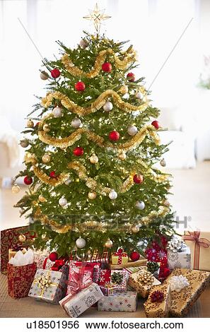 Colorful gifts under christmas tree View Large Photo Image Stock Photograph - Colorful gifts under christmas tree. Fotosearch