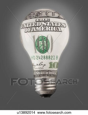 Composition of bulb and one hundred dollar note View Large Photo Image Picture - Composition of bulb and one hundred dollar note. Fotosearch
