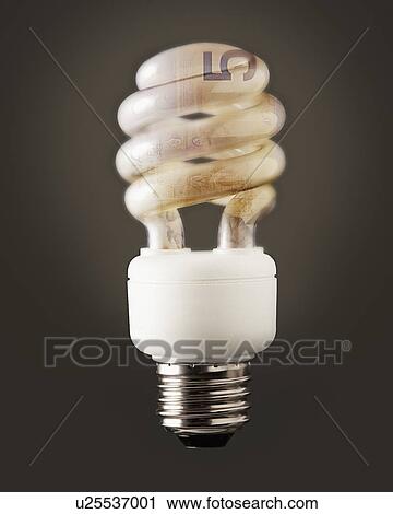 Composition of energy efficient bulb and five canadian dollar banknote View Large Photo Image Stock Image - Composition of energy efficient bulb and five canadian dollar banknote. Fotosearch