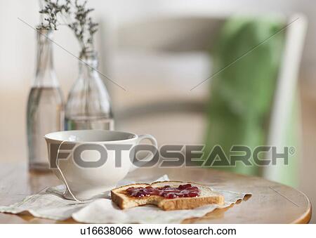 Cup of tea and toast with marmalade View Large Photo Image Stock Photograph - Cup of tea and toast with marmalade. Fotosearch