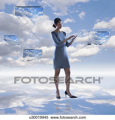 Digital composite of woman and cloudscape View Large Photo Image Stock Photography - Digital composite of woman and cloudscape. Fotosearch