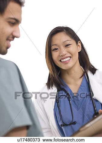 Female doctor and surgeon View Large Photo Image Stock Image - Female doctor and surgeon. Fotosearch
