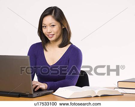female student working on laptop View Large Photo Image Stock Image - female student working on laptop. Fotosearch