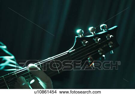 Hand playing guitar View Large Photo Image Picture - Hand playing guitar. Fotosearch
