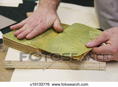 Hands binding book View Large Photo Image Stock Photograph - Hands binding book. Fotosearch