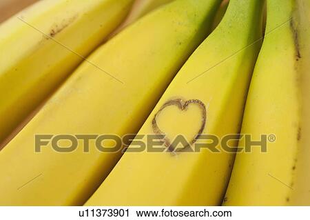 Heart shape on ripe bananas View Large Photo Image Stock Image - Heart shape on ripe bananas. Fotosearch