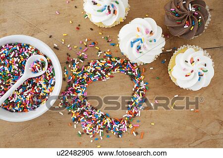 Stock Photography - Heart shaped rice with spoon and bowl. Fotosearch