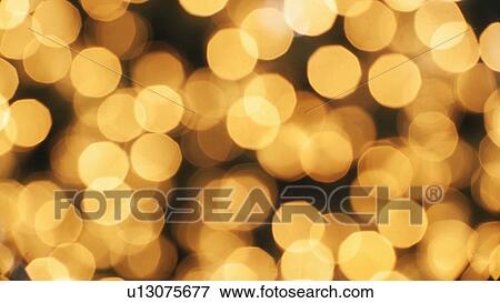Illuminated Christmas tree lights View Large Photo Image Stock Photo - Illuminated Christmas tree lights. Fotosearch