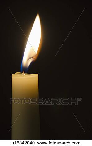Lit candle on black background View Large Photo Image Stock Image - Lit candle on black background. Fotosearch