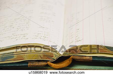 Stock Photo - Open diary, close-up. Fotosearch