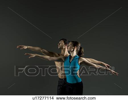Pair of ballet dancers practicing View Large Photo Image Picture - Pair of ballet dancers practicing. Fotosearch