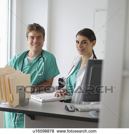 Stock Photo - Portrait of female doctor and surgeon. Fotosearch