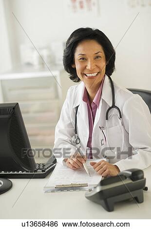 Portrait of female doctor View Large Photo Image Stock Photograph - Portrait of female doctor. Fotosearch