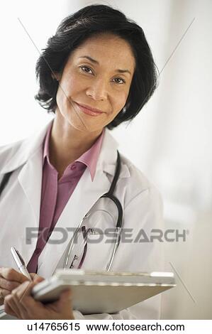 Stock Photography - Portrait of female doctor. Fotosearch