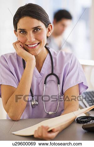 Portrait of female nurse View Large Photo Image Stock Photo - Portrait of female nurse. Fotosearch