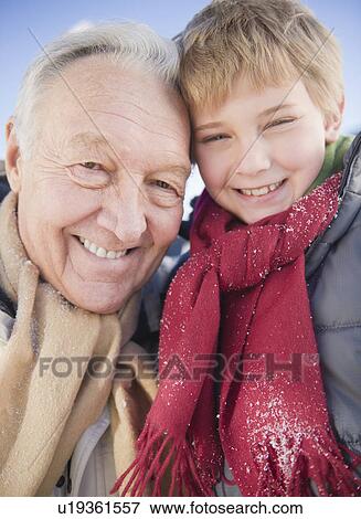 Portrait of grandfather with grandson (8-9) in winter View Large Photo Image Stock Photo - Portrait of grandfather with grandson (8-9) in winter. Fotosearch