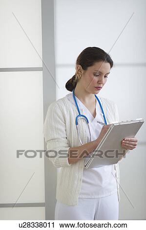 Stock Image - Portrait of nurse. Fotosearch