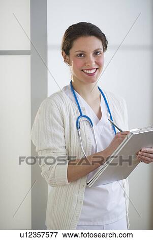 Stock Photo - Portrait of nurse. Fotosearch