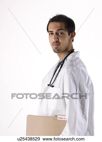 Stock Photo - Portrait of young doctor. Fotosearch