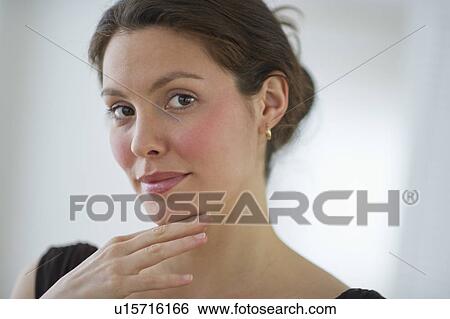 Portrait of young woman View Large Photo Image Stock Photograph - Portrait of young woman. Fotosearch