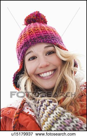 Portrait of young woman wearing winter clothes outdoors View Large Photo Image Stock Photo - Portrait of young woman wearing winter clothes outdoors. Fotosearch