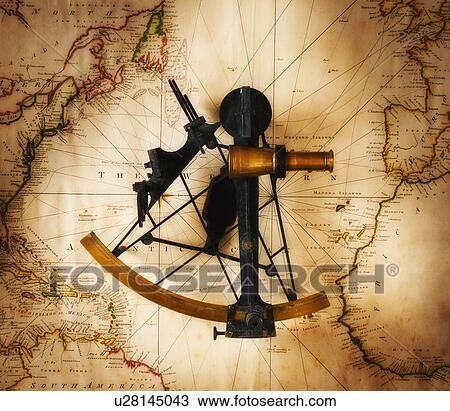 Stock Image - Sextant on old map, directly above. Fotosearch