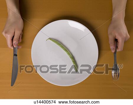 Single bean on white plate View Large Photo Image Picture - Single bean on white plate. Fotosearch