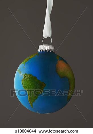 Studio Shot of Christmas ornament imitating globe View Large Photo Image Picture - Studio Shot of Christmas ornament imitating globe. Fotosearch