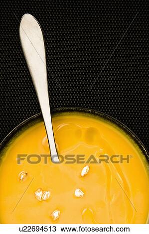 Studio shot of yellow dessert View Large Photo Image Stock Image - Studio shot of yellow dessert. Fotosearch