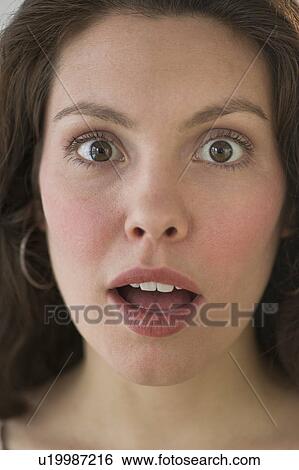 Studio shot of young woman View Large Photo Image Stock Photograph - Studio shot of young woman. Fotosearch