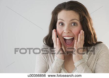 Studio shot of young woman View Large Photo Image Stock Photograph - Studio shot of young woman. Fotosearch