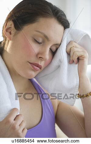Tired young woman at fitness View Large Photo Image Picture - Tired young woman at fitness. Fotosearch