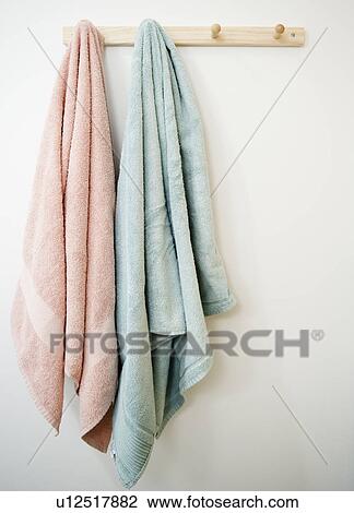 Towels hanging on rack View Large Photo Image Stock Image - Towels hanging on rack. Fotosearch