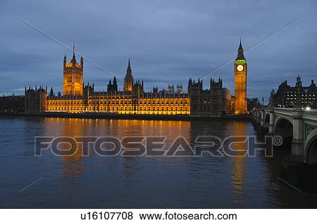 United Kingdom, London, Houses of Parliament illuminated at dusk View Large Photo Image Stock Photo - United Kingdom, London, Houses of Parliament illuminated at dusk. Fotosearch