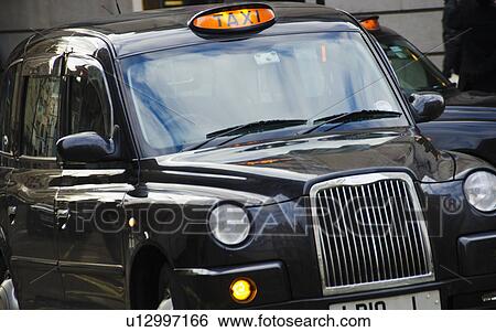 United Kingdom, Traditional black cab View Large Photo Image Stock Photograph - United Kingdom, Traditional black cab. Fotosearch