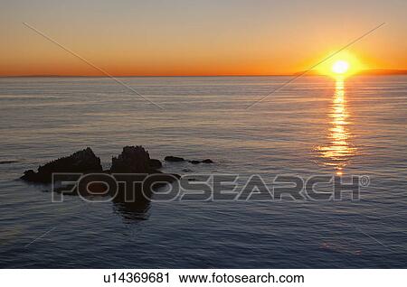 USA, California, Laguna Beach, sunset over Pacific Ocean View Large Photo Image Stock Image - USA, California, Laguna Beach, sunset over Pacific Ocean. Fotosearch