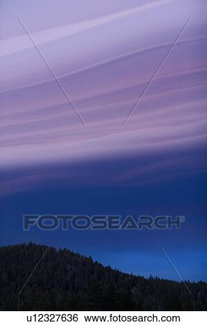 Stock Photograph - USA, California, Lake Tahoe, Landscape with lenticular clouds. Fotosearch