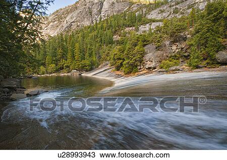 Stock Image - USA, California, Yosemite National Park, Merced River. Fotosearch